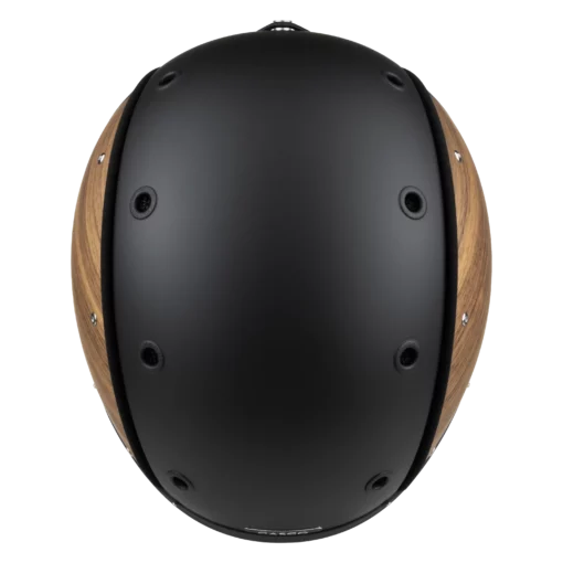 Schwarzer Skihelm von oben mit seitlichen Holzpaneelen und rund angeordneten Belüftungsöffnungen.